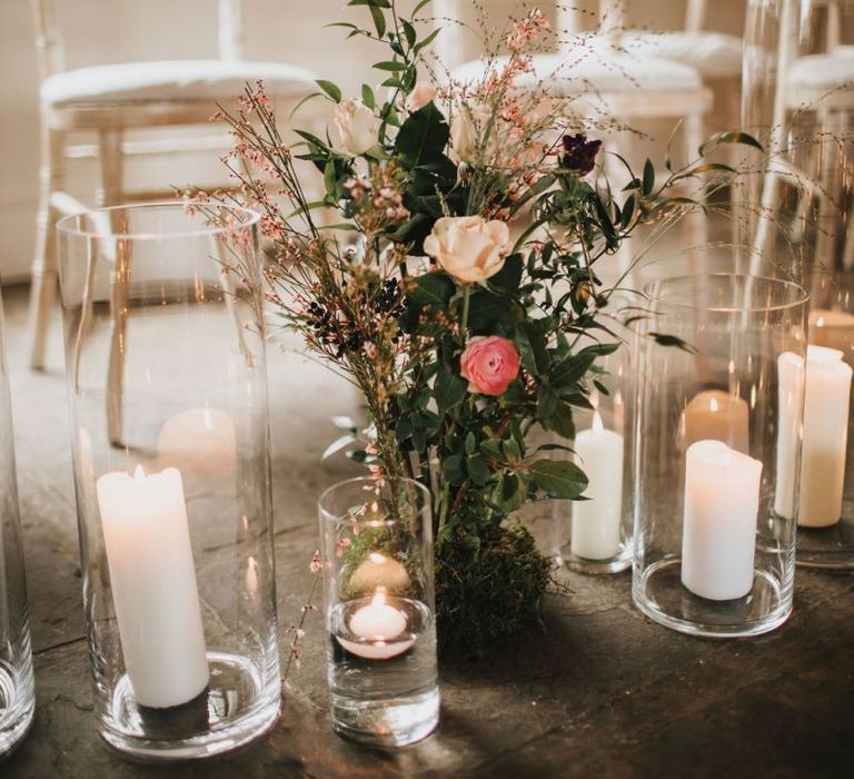 Wedding ceremony flowers and candles at Healing Manor