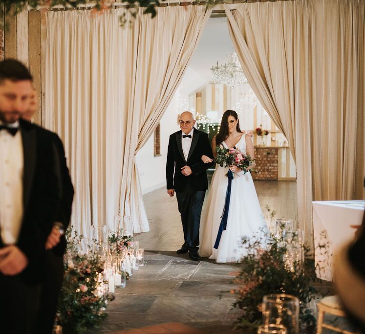 Bride enters the ceremony at Healing Manor wedding