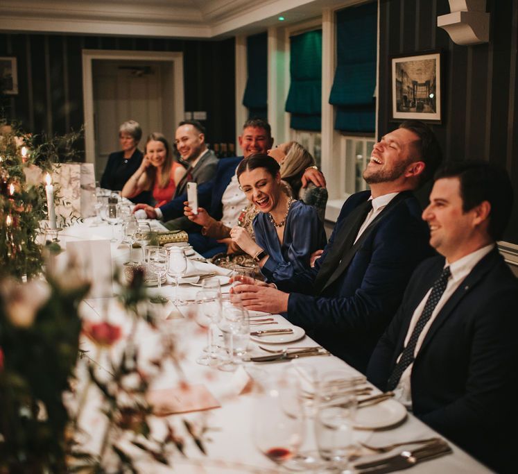 Guests enjoy wedding speeches