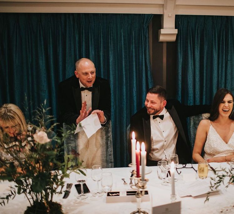 Guests enjoy wedding speeches