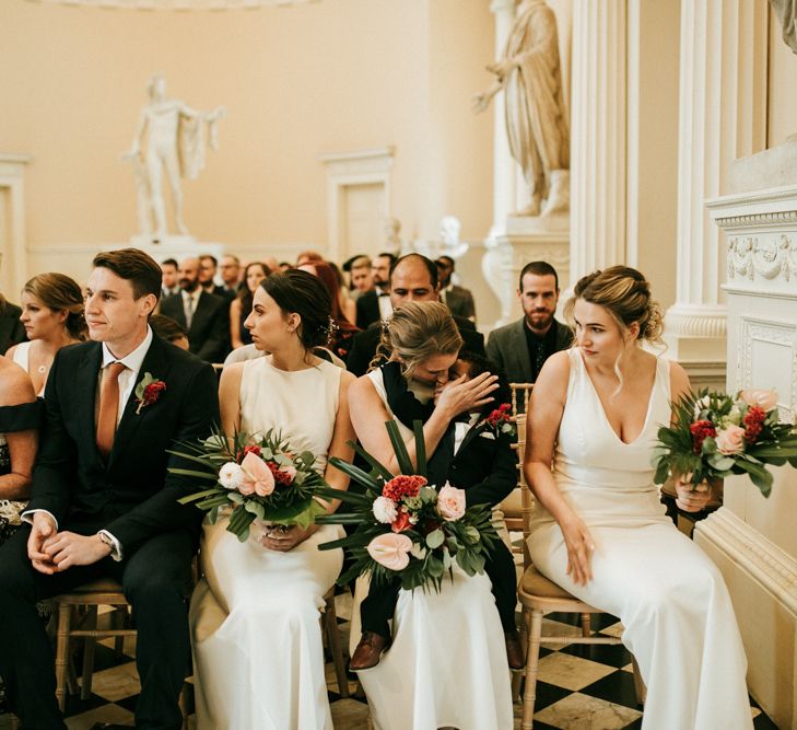 Bridesmaids in White Dresses During The Wedding Ceremony