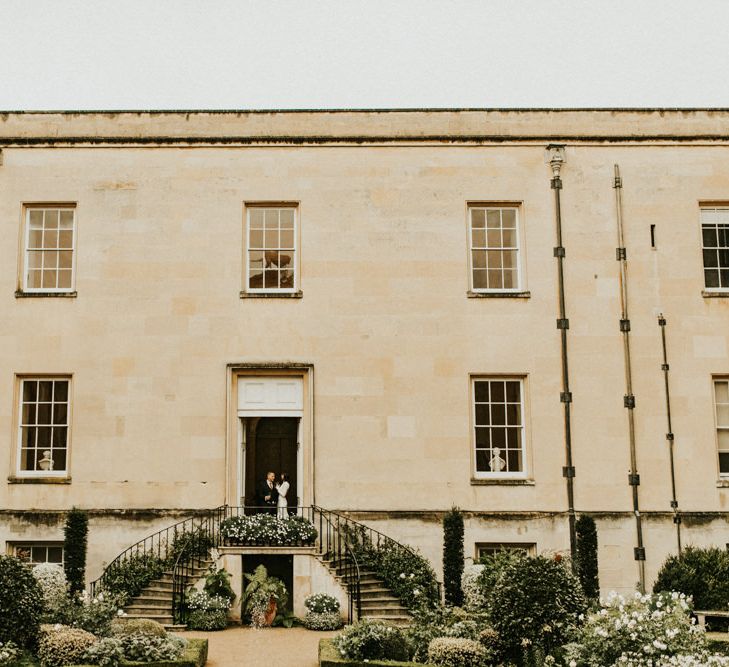 Bride and Groom Portrait Standing at the Top of Syon Park Steps