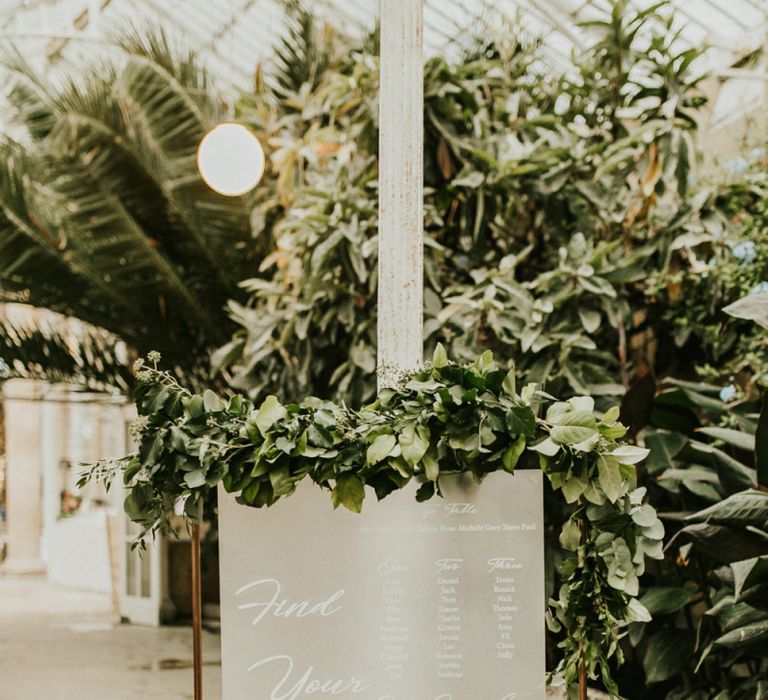 Copper Framed Table Plan with Grey Seating Chart and Foliage Decor