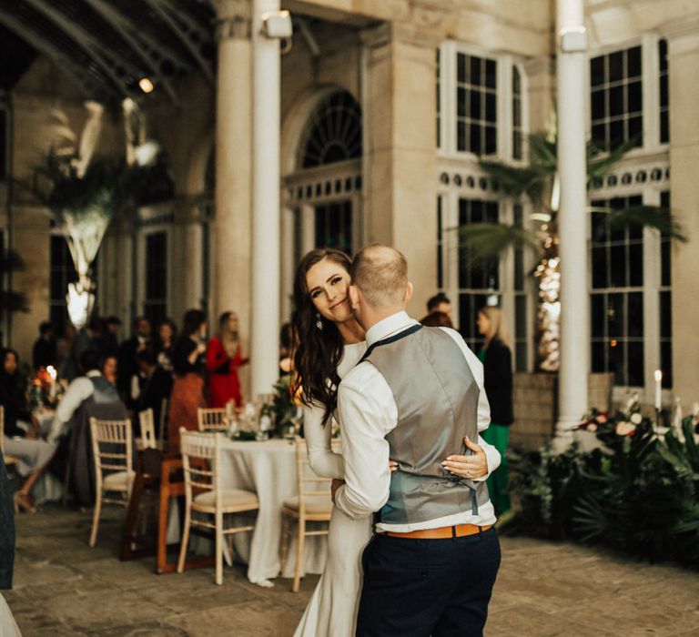 Bride and Groom Having Their First Dance