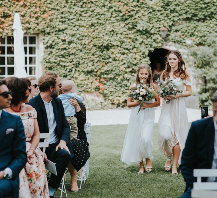 Bridesmaids In White Dresses With Rustic Organic Feel Oversized Bouquets