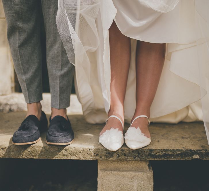 Flat wedding shoes for bride at rustic barn wedding