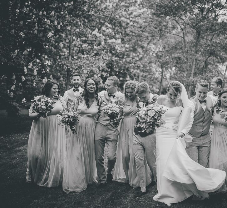 Wedding party at Tythe Barn rustic celebration