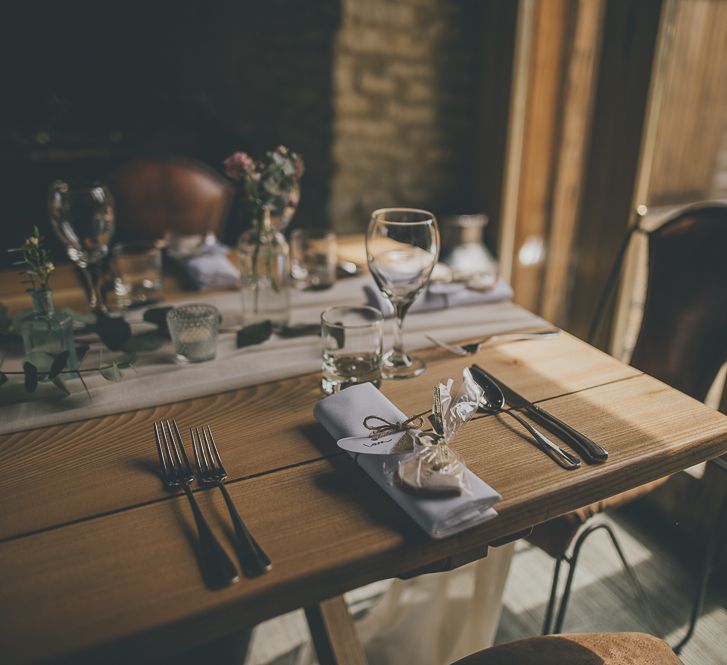 Wedding table decor with biscuit wedding favours