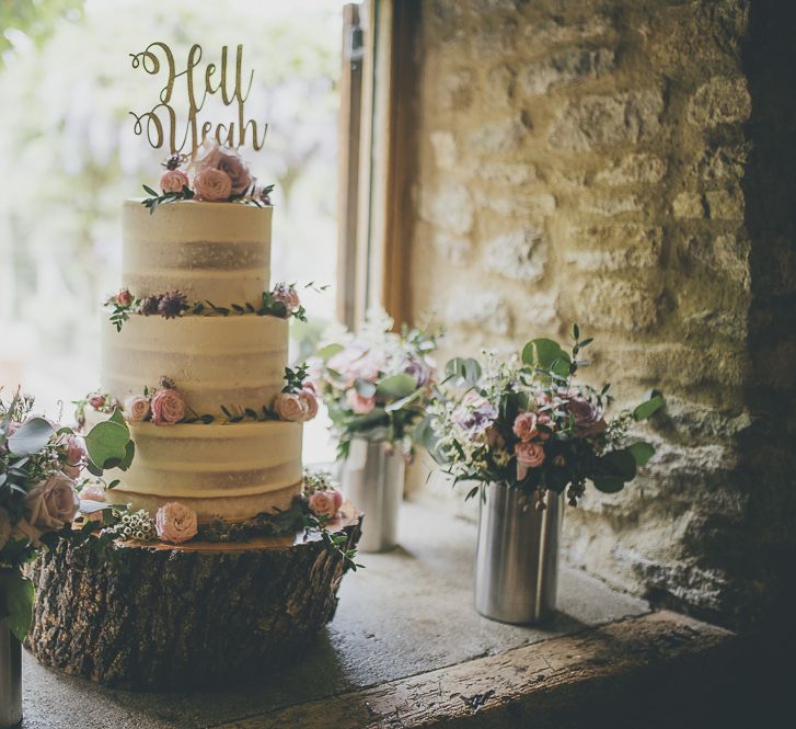 Semi-naked wedding cake for rustic barn wedding