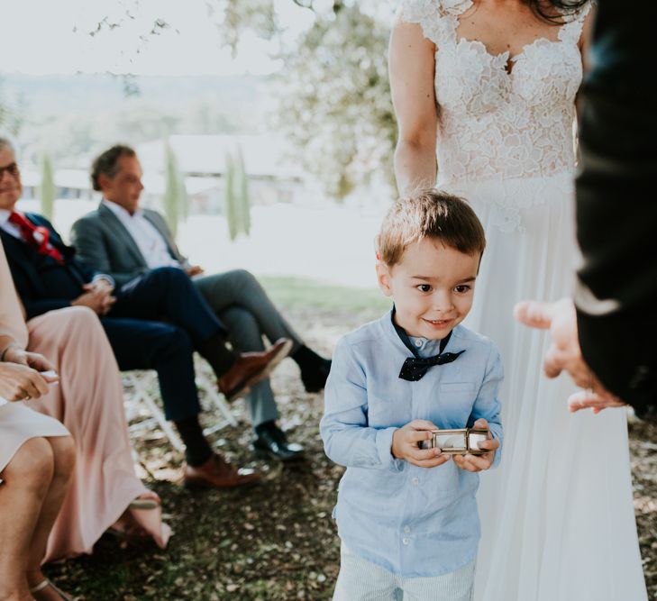 Little Boy Ring Bearer in Blue Shirt and Bow Tie