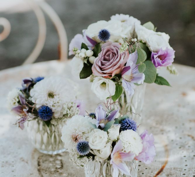 Clustered White and Lilac Wedding Flowers in Vase