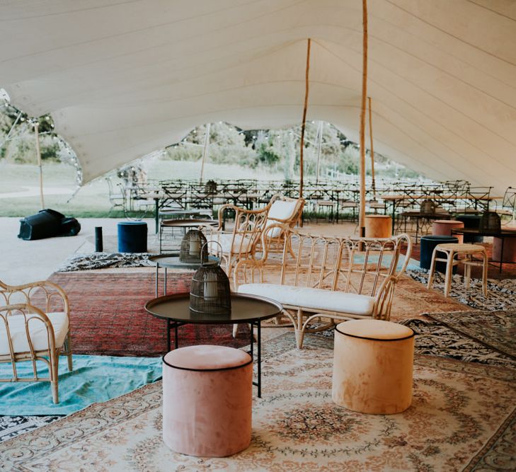 Stretch Tent Chill Out Area with Rugs, Poufs and Wicker Chairs