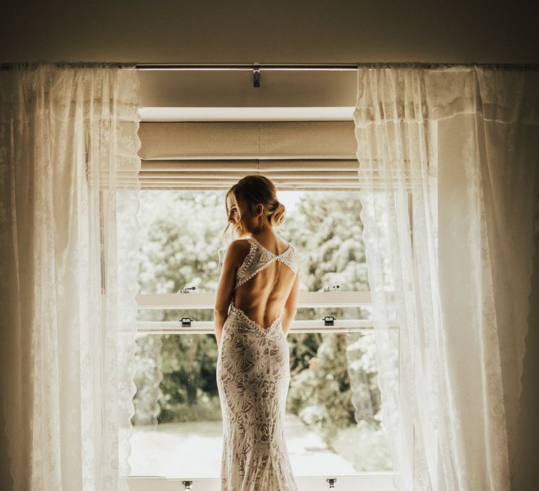 Bride in Embroidered Grace Loves Lace Gown with Fringing and Cut Out Back | Outdoor Ceremony at Fishley Hall with Grace Loves Lace Fringe Dress | Darina Stoda Photography