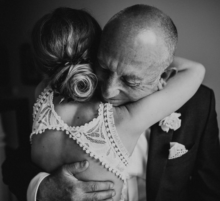 Father of the Bride First Look | Bride in Embroidered Grace Loves Lace Gown with Fringing and Cut Out Back | Father of the Bride in Black Gagliardi Suit with Bow Tie and Braces | Outdoor Ceremony at Fishley Hall with Grace Loves Lace Fringe Dress | Darina Stoda Photography