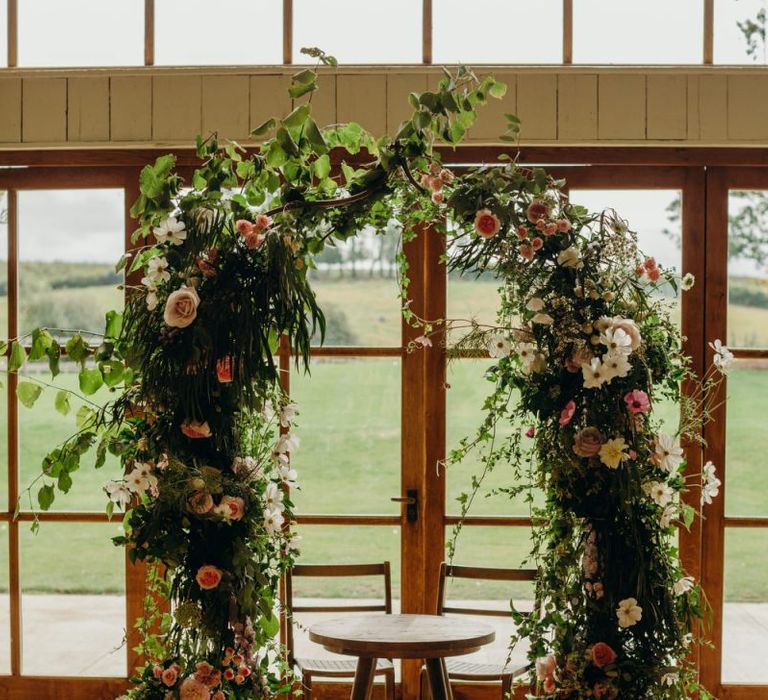 Flower arch with wildflowers and foliage