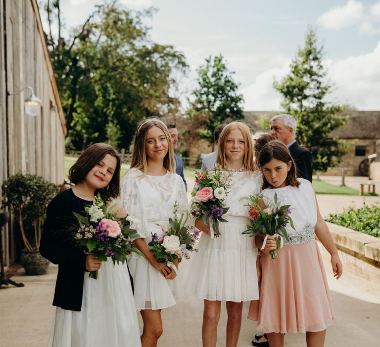 Young Bridesmaids in White and Blush Dresses