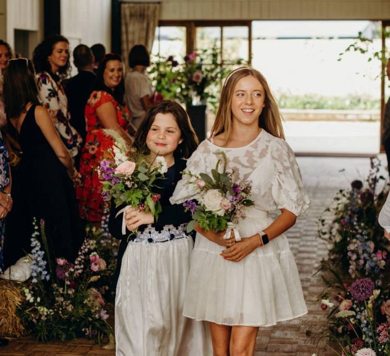 Flower Girls Walking Down the Aisle