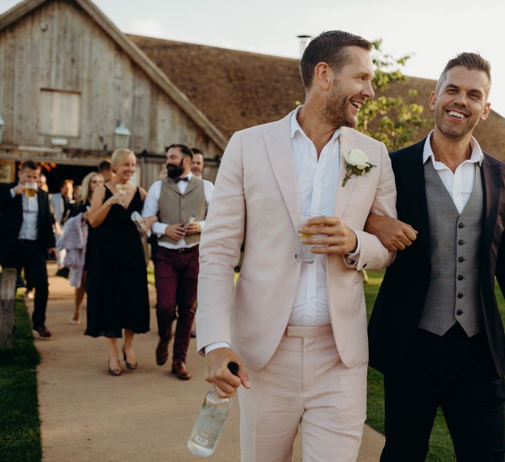 Male Guest  in Pale Pink Suit