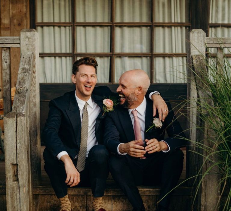 Two Grooms Embracing for Wedding Portrait