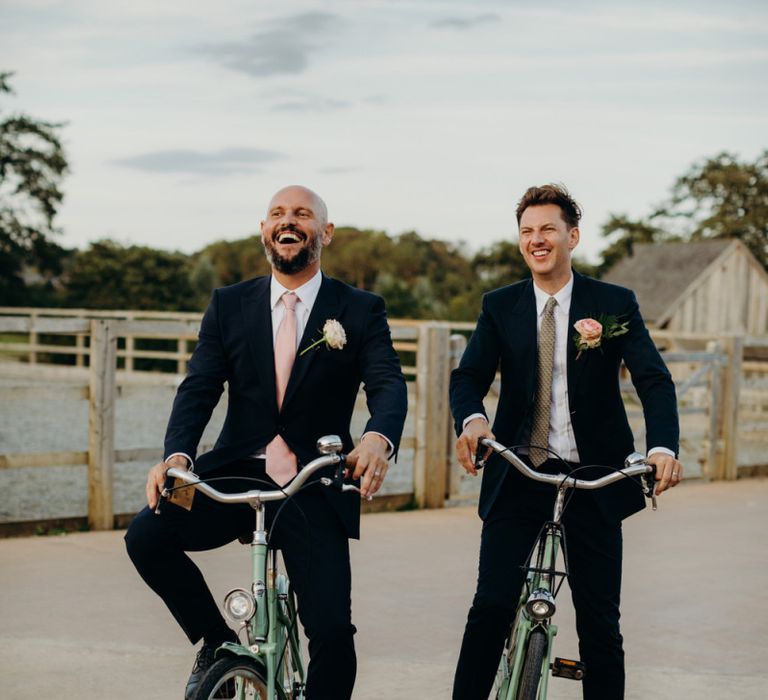 Two Grooms in Vintage Bicycles