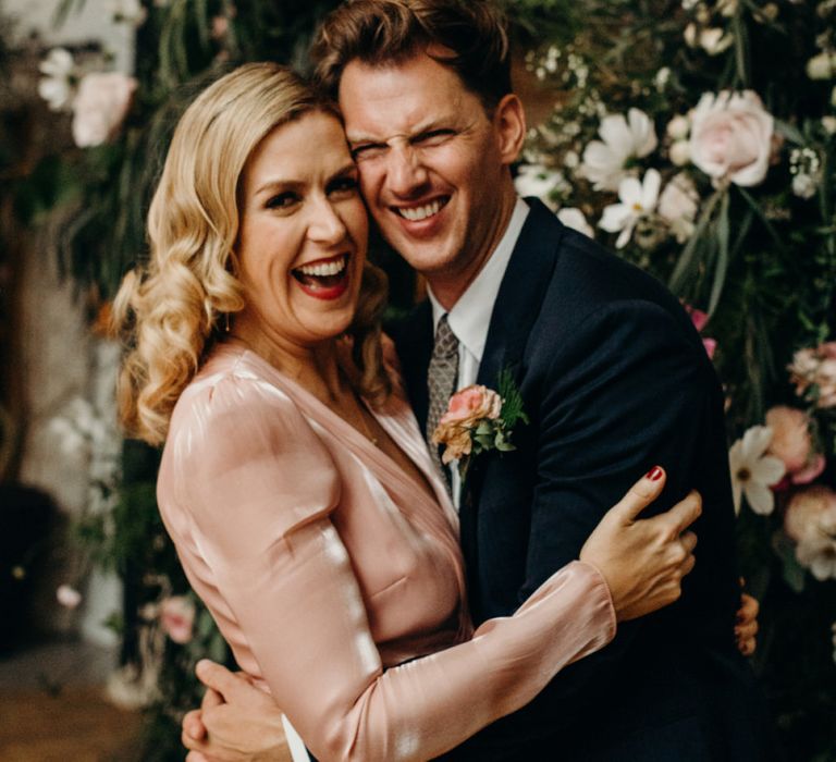 Groom and Sister Embracing