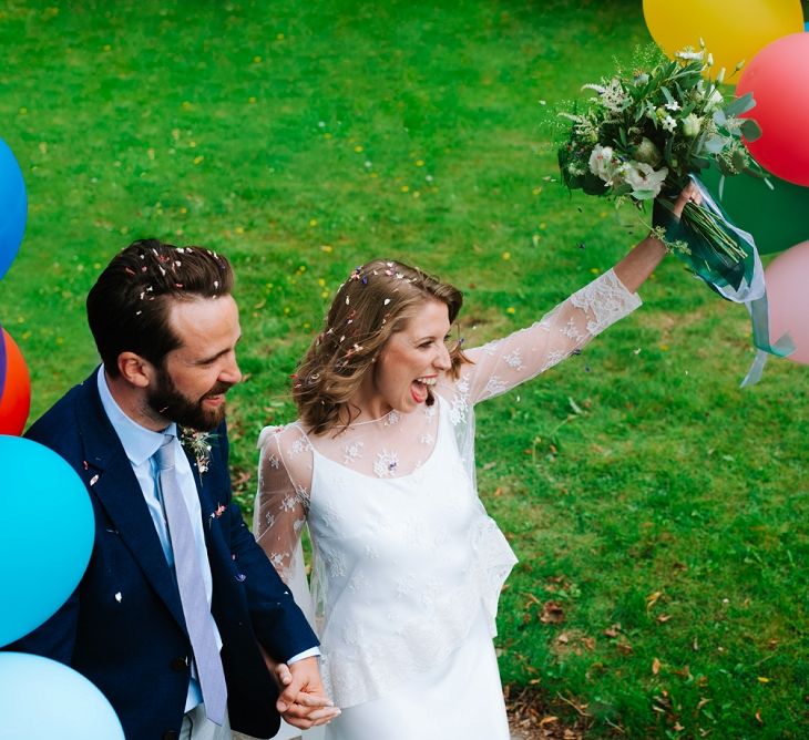 Bride in Delphine Manivet Gown | Groom in Navy Blazer &amp; Grey Trousers | Fun Stretch Tent Reception on Primary School Field in Sheffield |  Tub of Jelly Photography