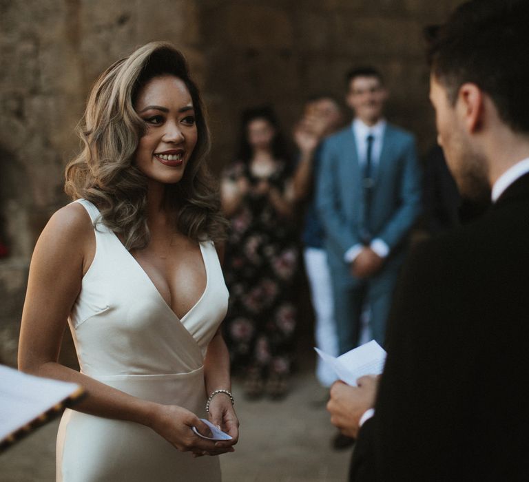 Wedding Ceremony | Bride in Silk Pallas Couture Wedding Dress with Plunging Neckline and Side Split | Roman &amp; French Cathedral Veil | Groom in Made to Measure Tuxedo Suit by Oscar Hunt | Intimate Italian Castle Wedding with Prosecco Tower | James Frost Photography