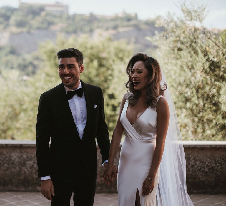 Wedding Ceremony | Bride in Silk Pallas Couture Wedding Dress with Plunging Neckline and Side Split | Roman &amp; French Cathedral Veil | Groom in Made to Measure Tuxedo Suit by Oscar Hunt | Intimate Italian Castle Wedding with Prosecco Tower | James Frost Photography