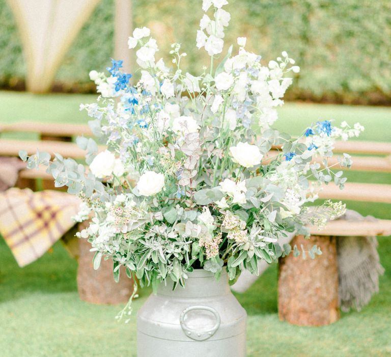 Milk Churn Filled with Blue and white Wedding Flowers