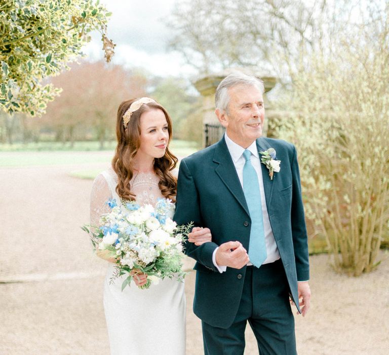 Bride and Father of The Bride Walking towards the Wedding Ceremony