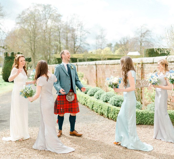 Bride and Groom Congratulated by the Wedding Party After Getting Married