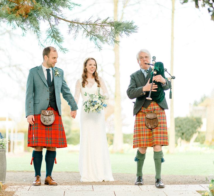 Bride and Groom Wedding Reception Entrance with Bag Piper