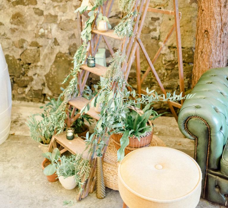 Vintage Step Ladder Covered in Foliage and Candles Wedding Reception Decor