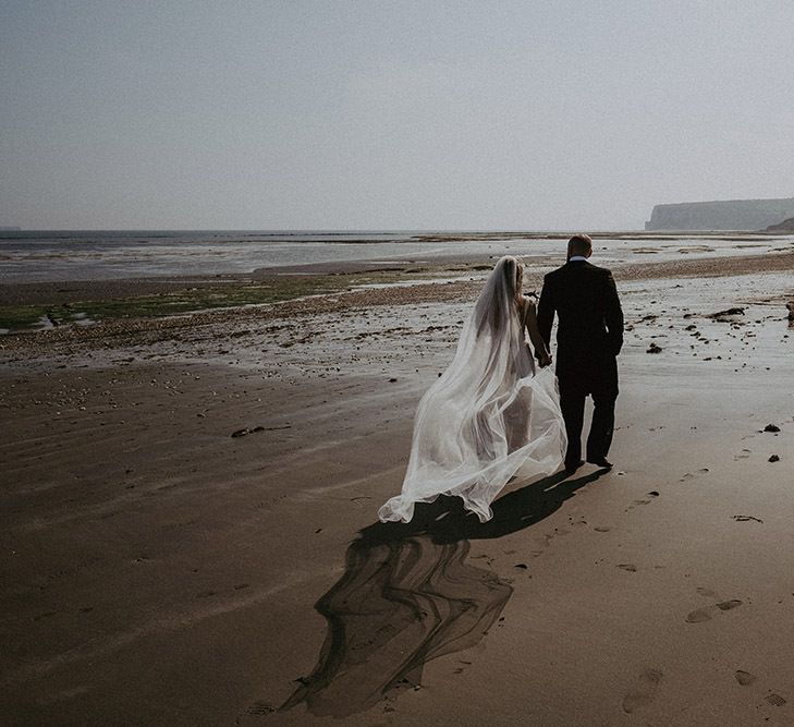 Bride &amp; Groom with Veil for Beach Wedding