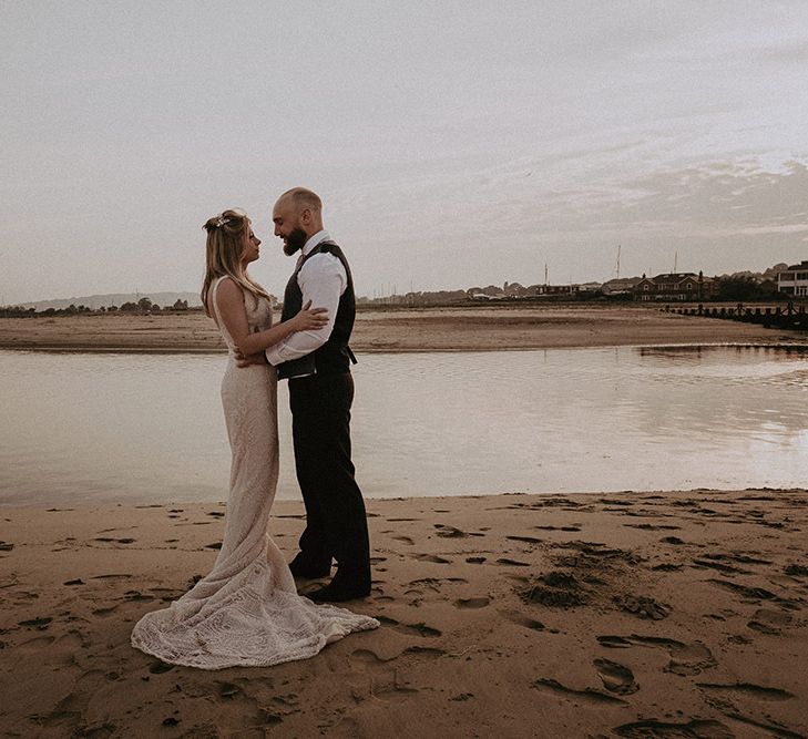 Bride and Groom in Beach Wedding with Boat