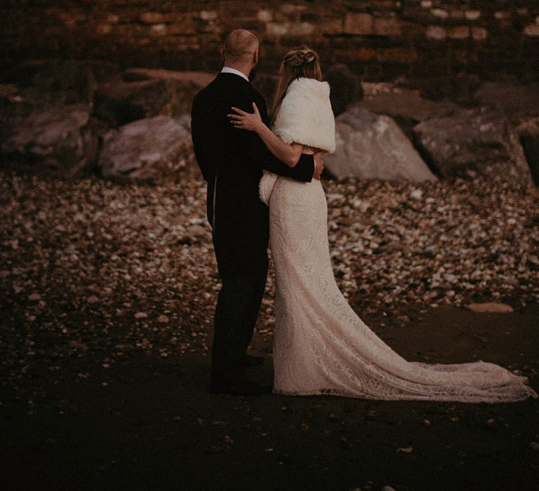 Bride Wearing Wrap for Evening Reception and Guests with Sparklers