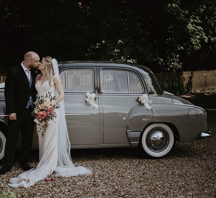 Vintage Wedding Car with Bride &amp; Groom Holding Peony  Bouquet