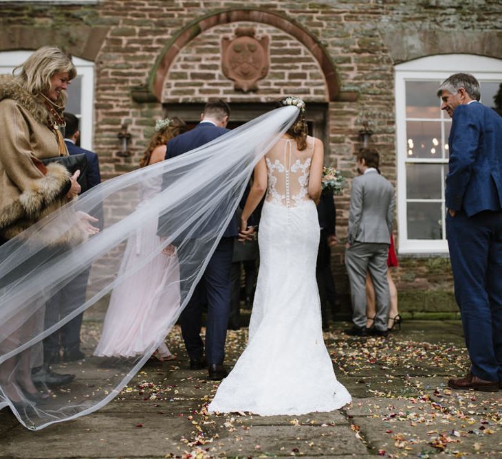 Brides Cathedral Length Veil Blowing in the Wind