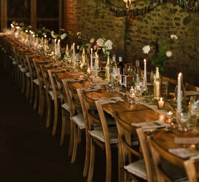 Long Tables with Candlelight and Flowers in Spray Painted Bottles