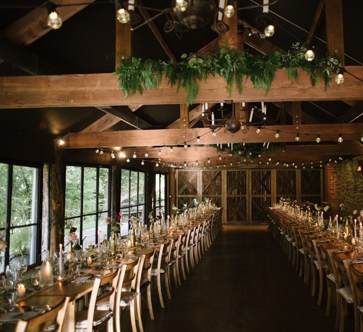 Rustic Barn Wedding Reception Decor with Romantic Candle Light