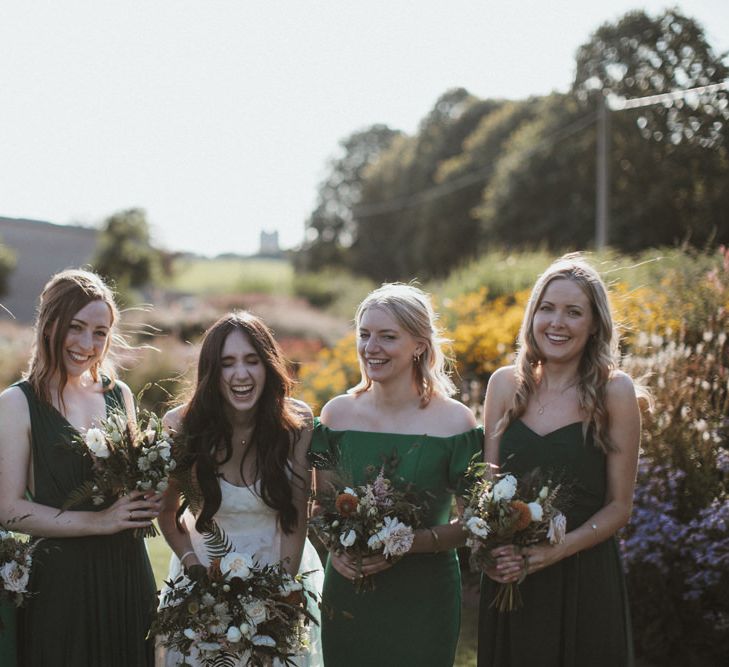 Bridal Party Wearing Green Bridesmaid Dresses