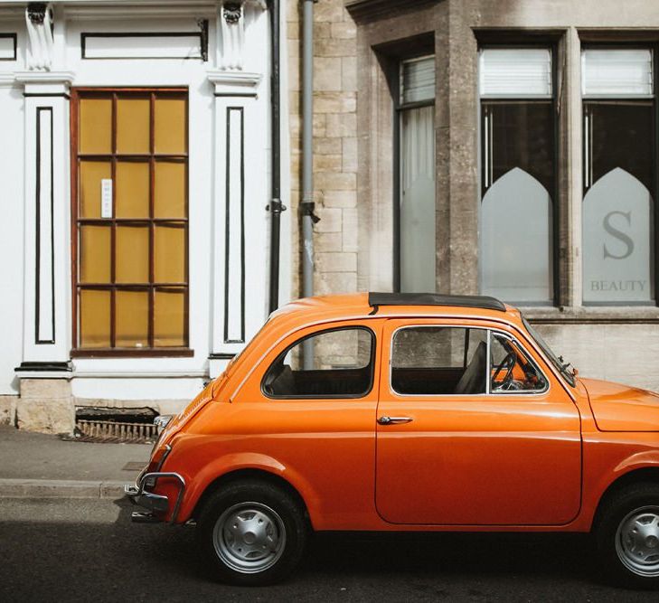 Orange Fiat 500 Wedding Car