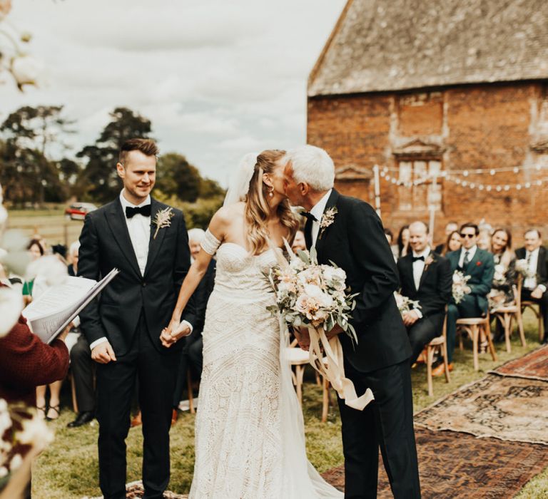 Father of the Bride Giving His Daughter Away at the Altar