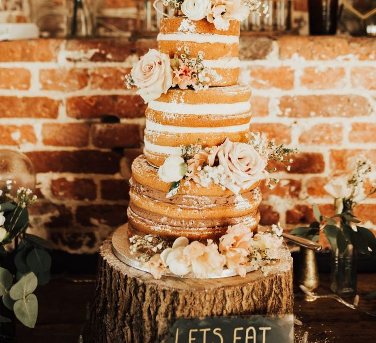 Naked Wedding Cake with Lasercut Cake Topper on Wooden Tree Slice Cake Stand