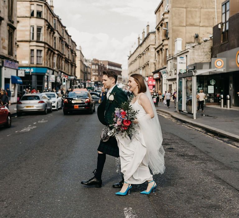 Bride and groom portraits walking around Glasgow