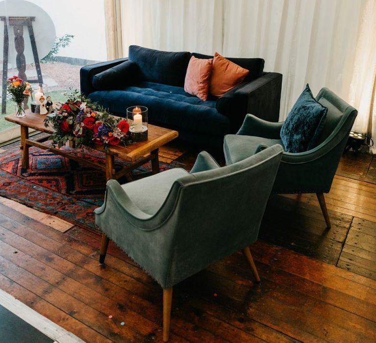 Chill out area with velvet sofa and chairs