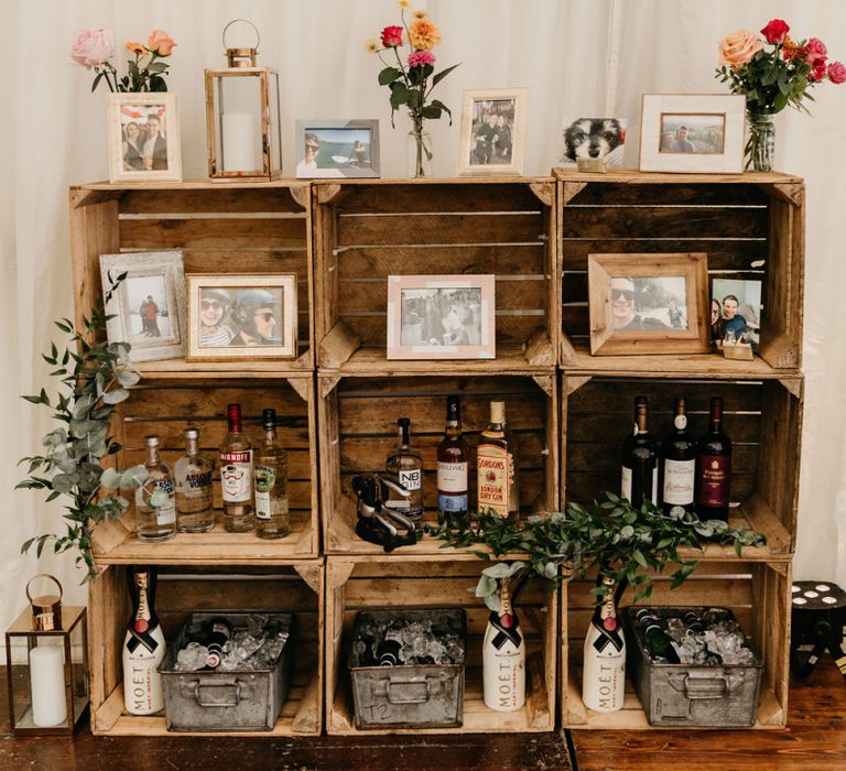 Wooden crate wedding decor  with framed portraits