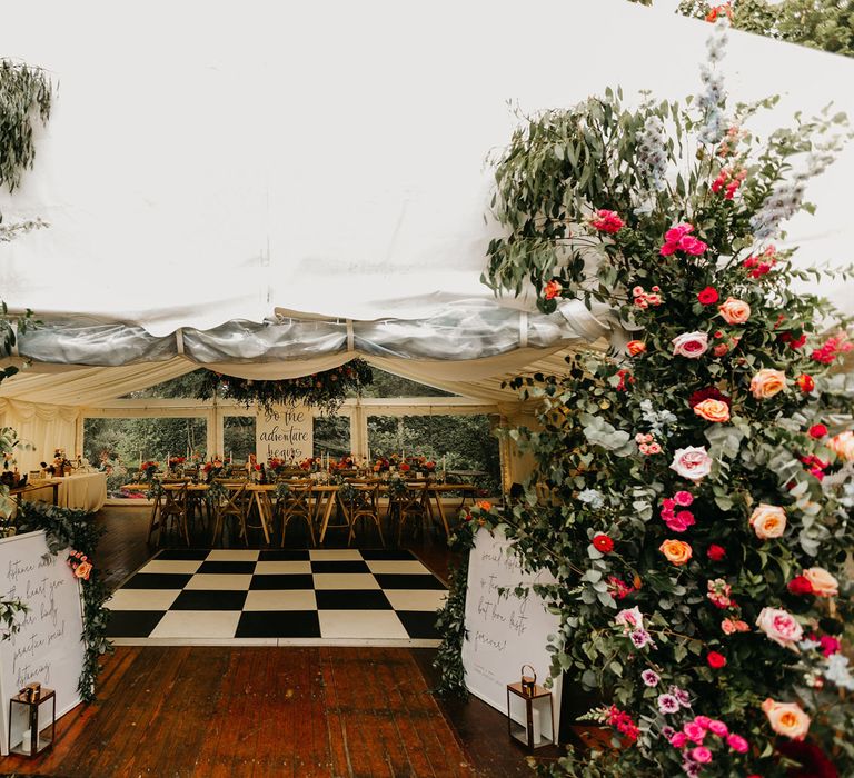 Colourful flowers decorating the marquee entrance