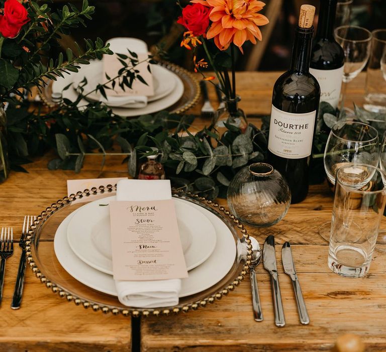 Place setting with glass charger plate