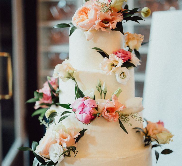 Iced Wedding Cake With Fresh Flowers // Images By Emily &amp; Steve